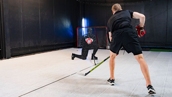 hockey player refining shooting technique